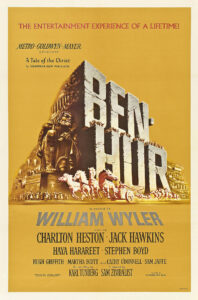 Poster original do filme Ben-Hur de 1959, destacando a corrida de bigas e o título do filme.